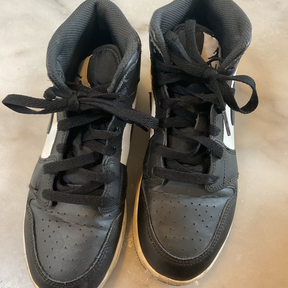 Jordan Kids Black and White High-Top Sneakers